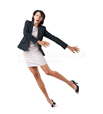 Buy stock photo Accident-prone female executive falling over against a white background