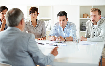 Buy stock photo Cropped shot of a business meeting in progress