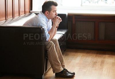 Buy stock photo Man, thinking and stress on sofa in waiting room for interview, recruitment or loss of job. Businessman, anxiety and sitting on couch with fear for unemployment, failure or hiring problem at work