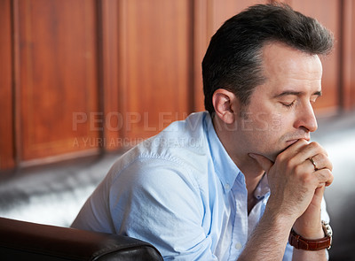 Buy stock photo Man, praying and thinking with stress on sofa in waiting room for interview, recruitment or loss of job. Businessman, anxiety or sitting on couch with fear of unemployment, failure or problem at work