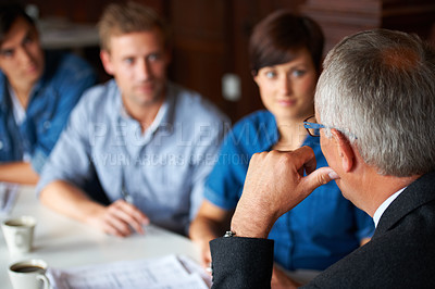 Buy stock photo Cropped shot of a business meeting in progress