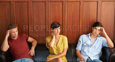 Buy stock photo Recruitment, job opportunity and bored people waiting on a sofa in an office for a human resources interview. Business, hiring and resume with an impatient candidate group in a workplace lobby