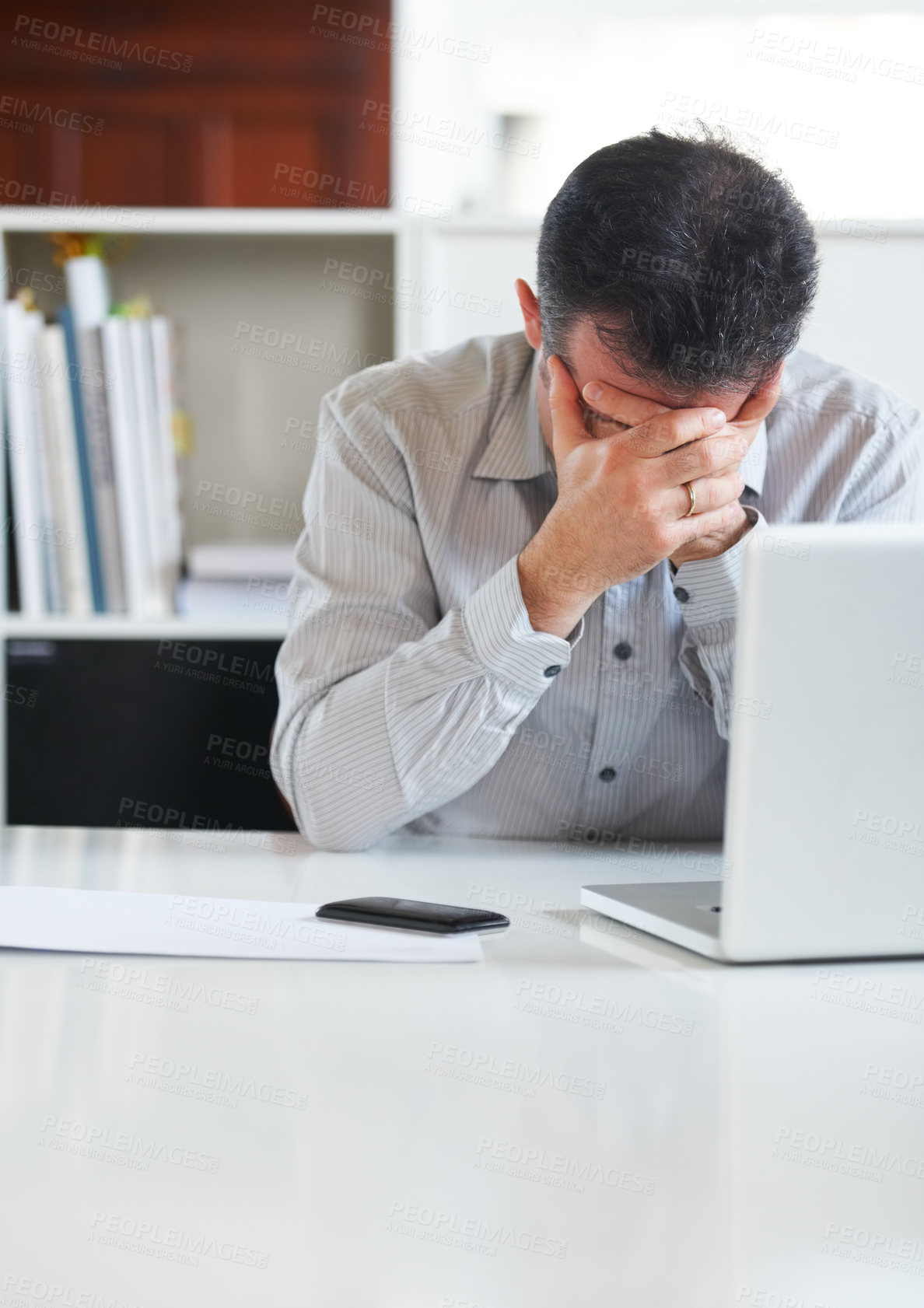 Buy stock photo Businessman, laptop and stress or depression at office, tired and fatigue for technology. Mature man, frustrated and fear for debt, problem and issues or bad investment, market crash and bankrupt