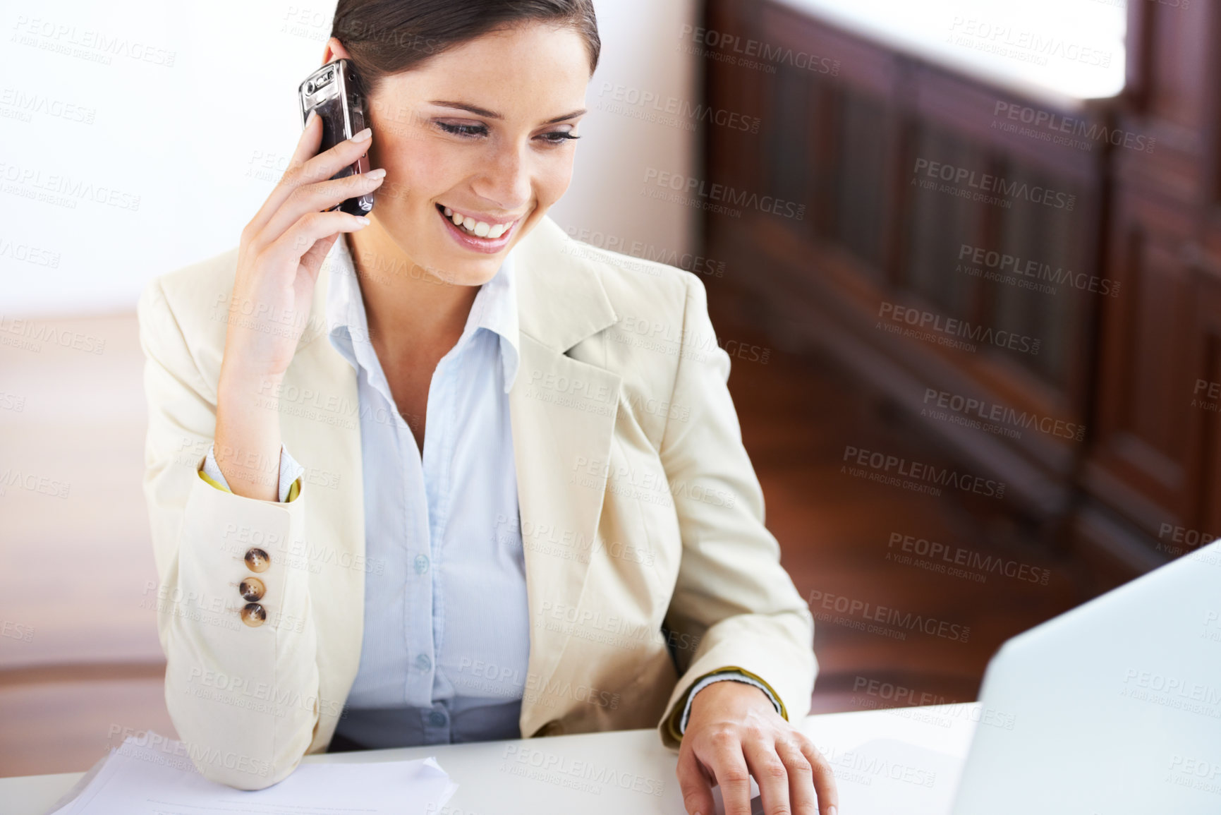 Buy stock photo Businesswoman, happy and phone call for communication in office for consulting, talk or conversation. Female analyst, corporate and smile on face for result, message and reading on laptop by internet