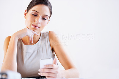 Buy stock photo Business, social media or woman on a phone for reading data, news update or mobile app report. Mockup space, white background or worker on website typing to research or chat on blog on break to relax