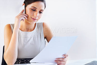 Buy stock photo Businesswoman, phone and reading of document in office for conversation, talk or communication with feedback. Professional, female manager and satisfied look on face for report, research or results