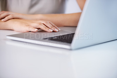 Buy stock photo Croppsed shot of a young businesswoman working in an office