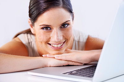 Buy stock photo Happy, laptop and business woman in office with positive, good and confident attitude for career. Smile, pride and professional young female creative designer from Canada with computer in workplace.