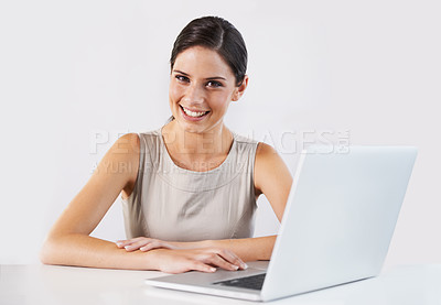 Buy stock photo IT woman, portrait and laptop for software, communication or research by white background in studio. Happy worker, computer or smile for a cybersecurity job, programming career and web connection