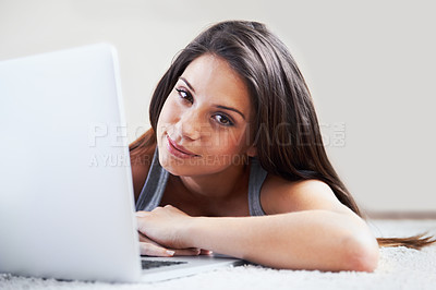 Buy stock photo Floor, laptop or portrait of woman in e learning, online education or typing for university at home. Remote work, relax or girl student on computer to research info or report on a college website