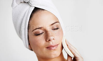 Buy stock photo Woman, face and cotton pad for beauty or skincare, exfoliating and cosmetics or treatment. Female model person, relax and facial or self care, wellness and white background in studio or mockup