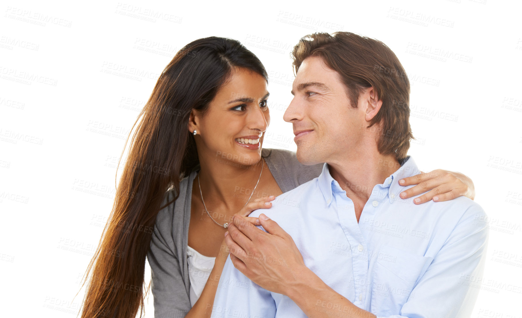 Buy stock photo Happy, love and couple hug in studio, smile and relax while bonding on white background. Interracial, marriage and moment by man with woman for valentines day, embrace and enjoy relationship isolated