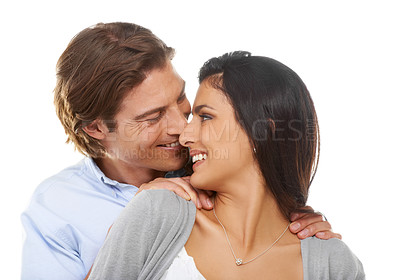 Buy stock photo Face, hug and love by couple in studio, happy and relax while bonding on white background. Interracial, romance and man hugging woman for valentines day, embrace or sweet relationship moment isolated