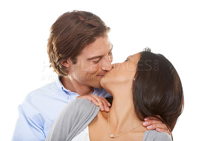 Buy stock photo Couple, kiss and affection for valentines day, love or embracing relationship isolated against a white studio background. Happy man and woman kissing lips for intimate romance, bonding or embrace