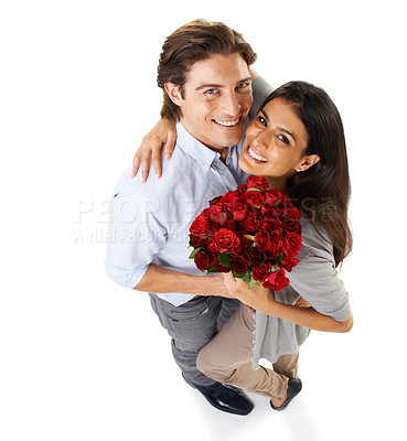 Buy stock photo Top view, portrait and couple with a bouquet of roses, happiness and isolated on white studio background. Mockup, happy man and woman with flowers, floral gift and love for romance, loving or bonding