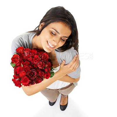 Buy stock photo Above, hug and woman with rose in studio for love, romance and valentines day against a white background space. Happy, smile and bouquet for indian girl embrace floral, gesture and romantic isolated