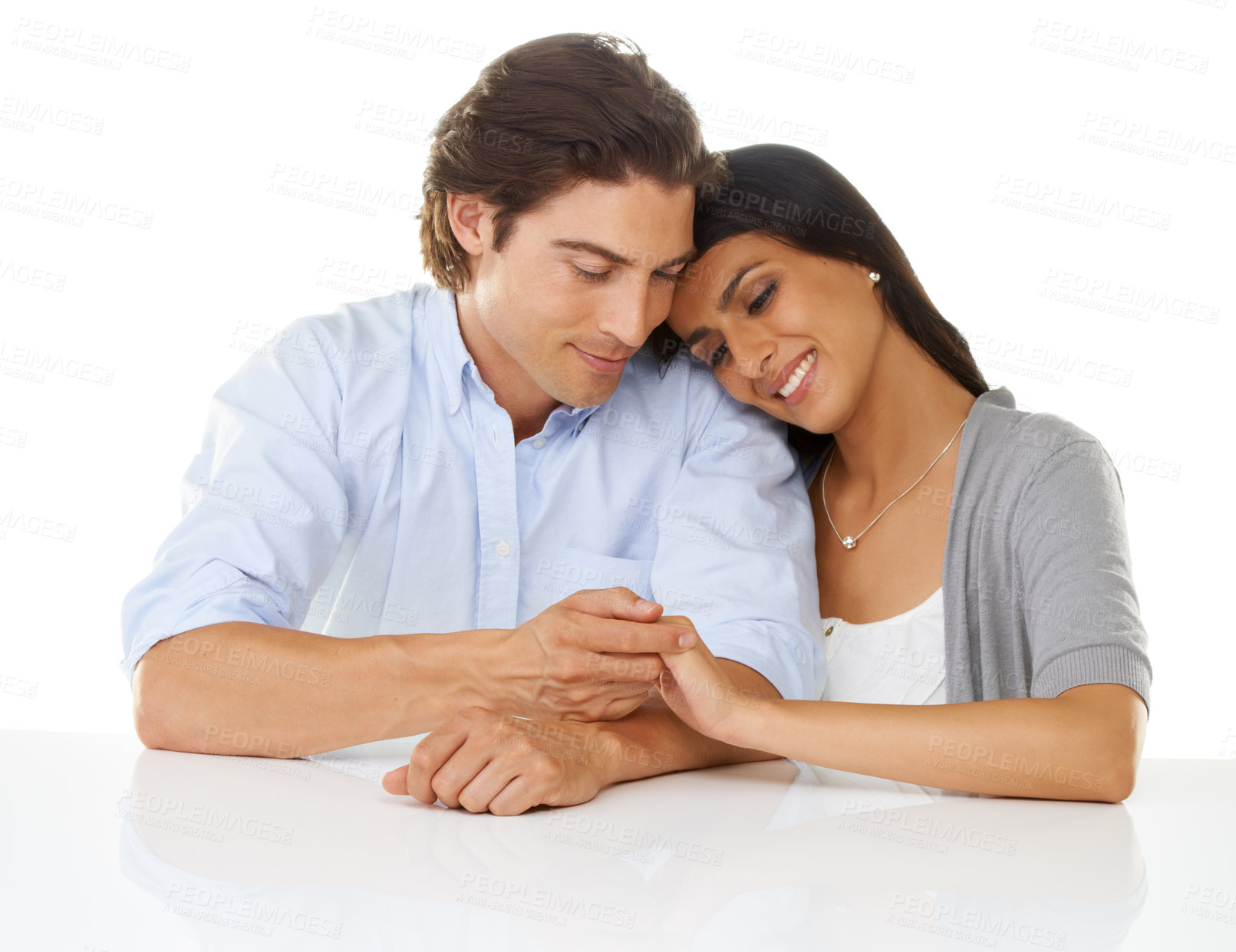 Buy stock photo Couple, hand holding and love of interracial people in a studio with white background. Smile, happiness and care of woman and man together with diversity and relax lifestyle feeling happy and calm