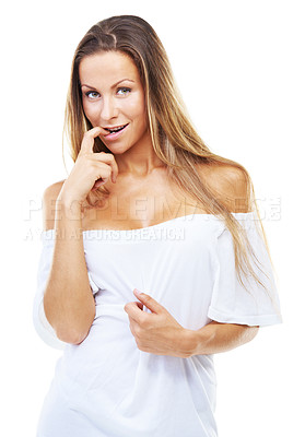 Buy stock photo Portrait, woman bite finger and tshirt for fashion in studio isolated on a white background. Face, happy model and girl in clothes for cleavage, trendy style and flirting with sexy body for beauty