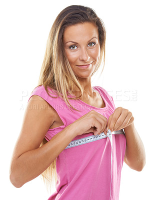 Buy stock photo Chest, measure tape and woman in happy portrait, breast reduction and plastic surgery in studio mockup. Model, face and smile for bust health, boobs cosmetic and fitness results by white background