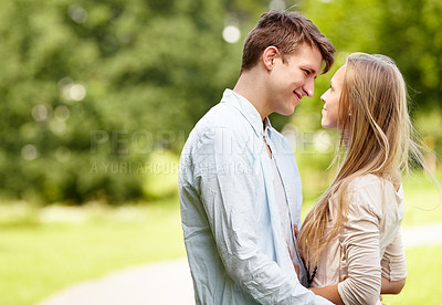 Buy stock photo Park, eye contact and happy couple hug, love and bonding in outdoor nature, green garden or romantic date. Happiness, wellness and spring man, woman or marriage people embrace for relationship care