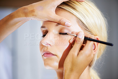 Buy stock photo Makeup, stylist and brush on face of woman for cosmetics, beauty or application of eyeshadow color. Eyes, powder and hands on model with cosmetic, mascara and skincare for celebrity or actor in salon