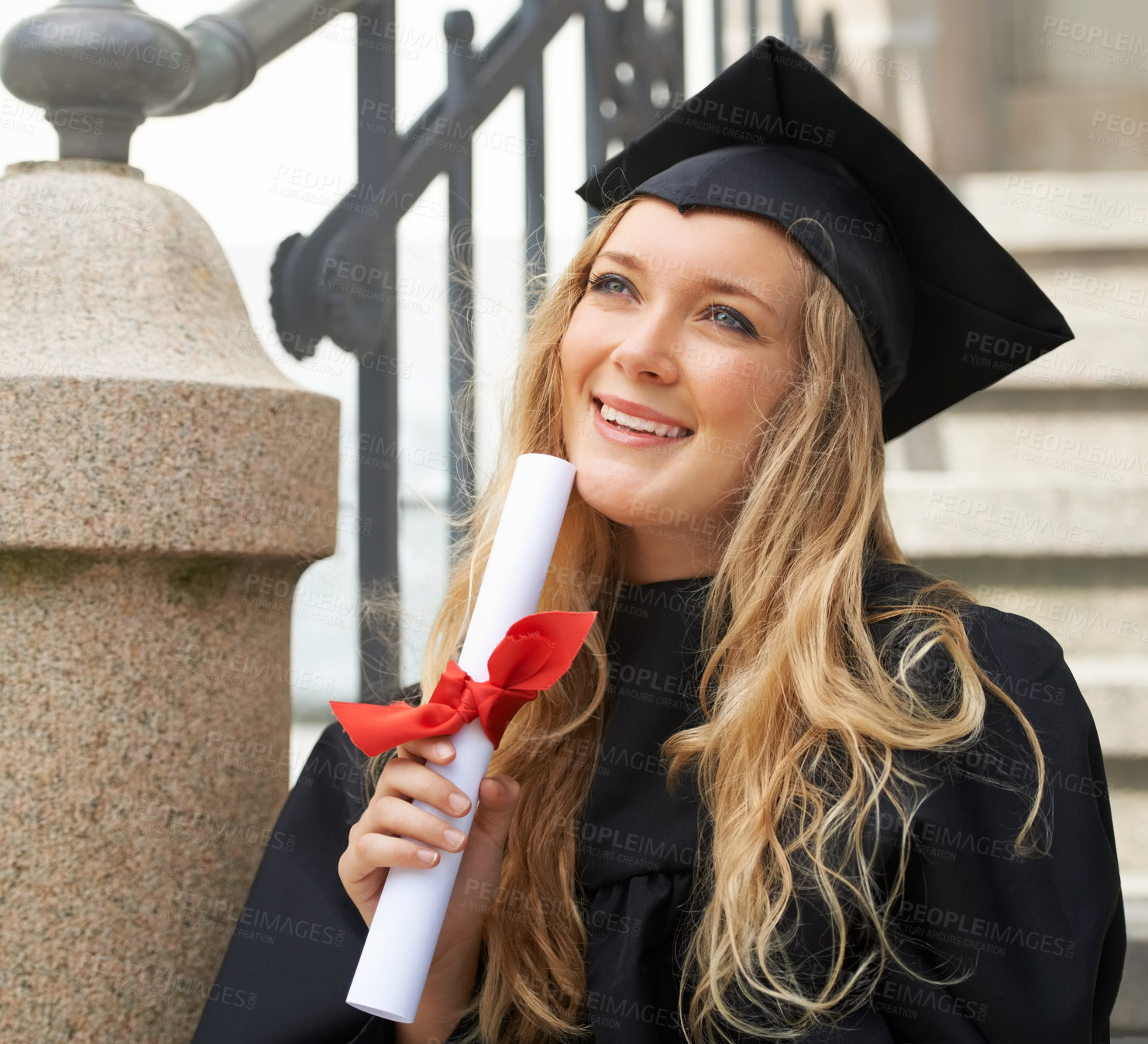Buy stock photo Inspired young graduate after graduation holding a diploma