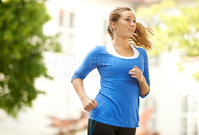 Buy stock photo Neighborhood, running and woman with fitness in exercise or outdoor cardio workout in urban, city or town. Healthy, runner or training with energy, motivation and goals for wellness in summer or park