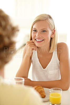 Buy stock photo Portrait of a couple sitting together and enjoying breakfast