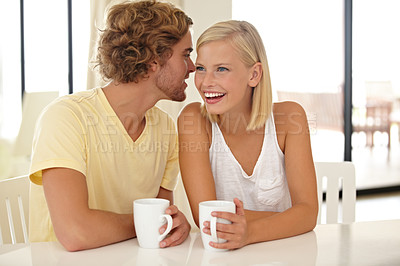Buy stock photo Portrait of a couple sitting together and enjoying a cup of coffee