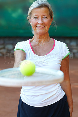 Buy stock photo Mature, woman and portrait smile for tennis racket on court or ball play, retirement workout or match ready. Female person, face and fun or exercise bat for health mobility, training sport or proud