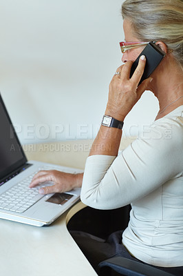 Buy stock photo Mature woman, laptop and work from home, telephone for company, remote working and technology. Office desk, internet and professional for job, web and employee for receptionist, call and typing email