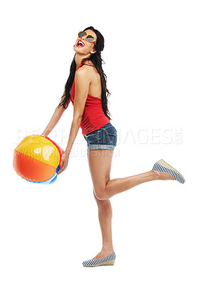 Buy stock photo Studio shot of an attractive young woman holding a beachball against a white background