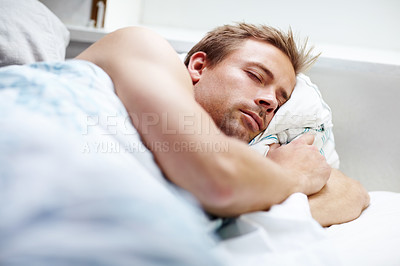 Buy stock photo Young guy sleeping deeping in bed at home
