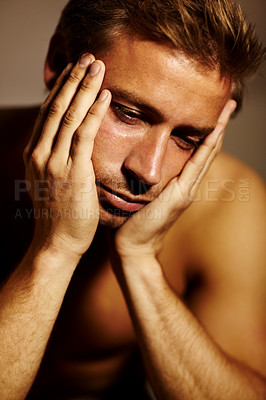 Buy stock photo Bedroom, thinking and man with anxiety, depression and mental health with fatigue, shirtless and morning. Person, apartment and guy with burnout, feeling alone and lonely with stress, sad and tired