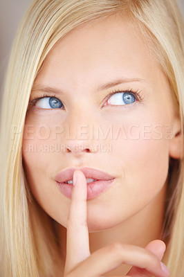 Buy stock photo Woman, silence and finger on lips for idea with sign, secret deal or thinking for skincare by background. Girl, hand and mouth for icon, whisper and gossip for decision, news or privacy in closeup