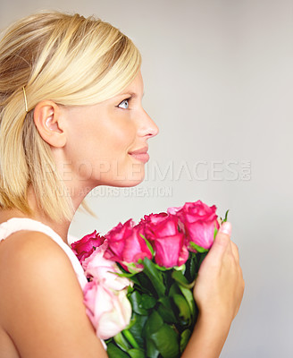Buy stock photo Woman, rose and bouquet in studio for valentines day, gift or thank you gesture on white background. Fresh, roses and girl with flowers, happy and relax with floral arrangement and mock up space