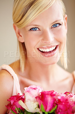 Buy stock photo Flowers, portrait and happy woman in a studio with roses for valentines day, anniversary or romantic event. Happiness, smile and female from canada with a pink floral bouquet by a nude background.