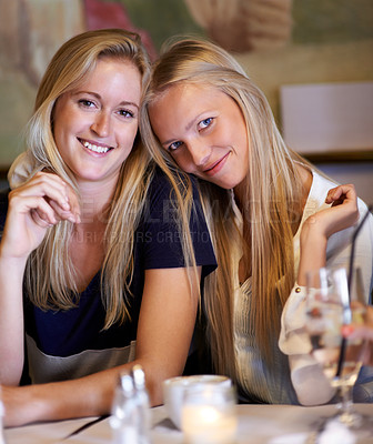 Buy stock photo Portrait, women or friends in a cafe, smile or relax with happiness, bonding together or funny. Face, people or girls with conversation, cheerful or restaurant with gossip, sharing secret or speaking