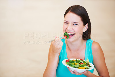 Buy stock photo Woman, portrait and laughing with healthy food or salad with vegetables, nutrition and health benefits. Happy female person on a nutritionist diet and eating vegan for weight loss, wellness or mockup