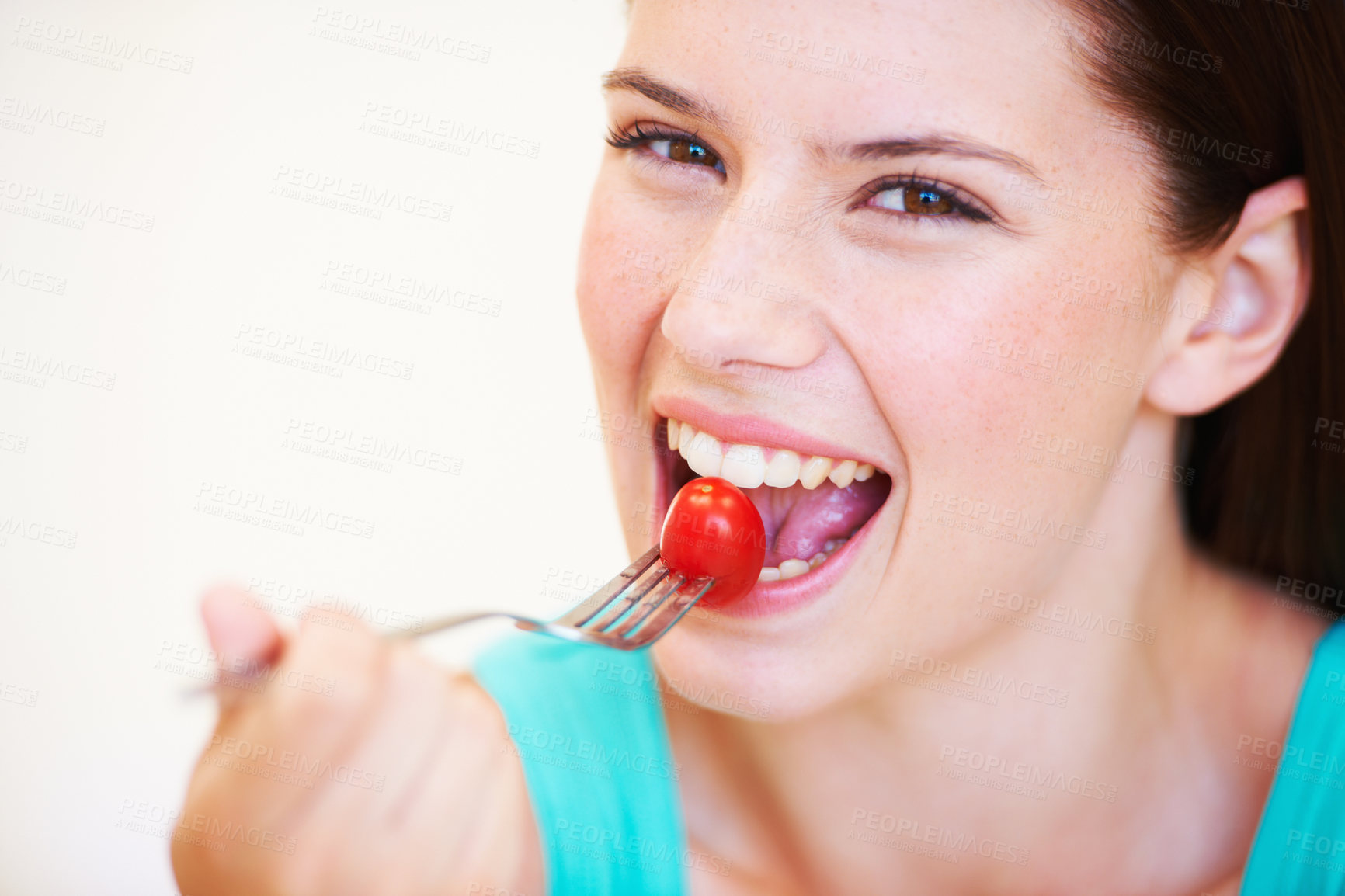 Buy stock photo Health, diet and portrait of woman with tomato eating for nutrition, wellness and snack in studio. Food, happy and face of person with salad for vitamins, detox and lose weight on white background