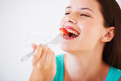 Buy stock photo Health, strawberry and woman with fruit in studio eating for nutrition, wellness and snack. Food, happy and face of person with berries for balance diet, detox and lose weight on white background