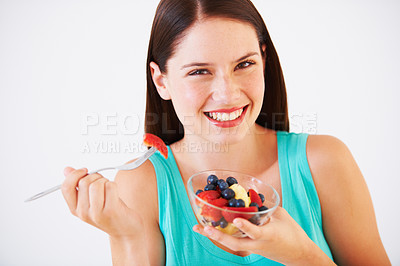 Buy stock photo Health, happy and portrait of woman with fruit salad eating for nutrition, wellness and berry snack in studio. Food, diet and face of person for vitamins, detox and lose weight on white background