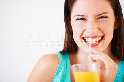 Buy stock photo Happy, drinking and portrait of woman with juice for nutrition, wellness and hydration in studio. Excited, smile and face of person with fruit blend for vitamins, detox and diet on white background