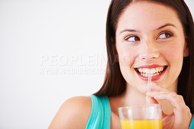 Buy stock photo Happy, drinking and face of woman with juice for nutrition, wellness and hydration in studio. Beverage, smile and thirsty person with fruit blend for vitamins, detox and diet on white background
