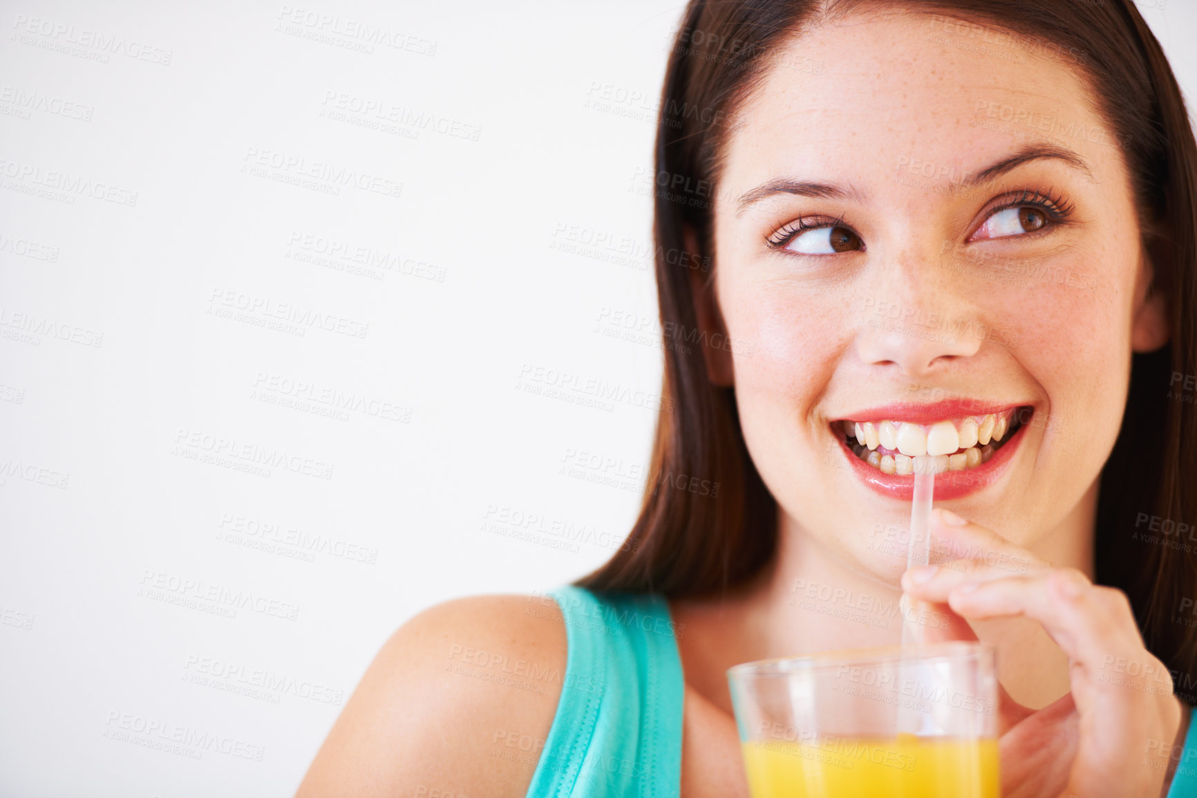 Buy stock photo Happy, drinking and face of woman with juice for nutrition, wellness and hydration in studio. Beverage, smile and thirsty person with fruit blend for vitamins, detox and diet on white background