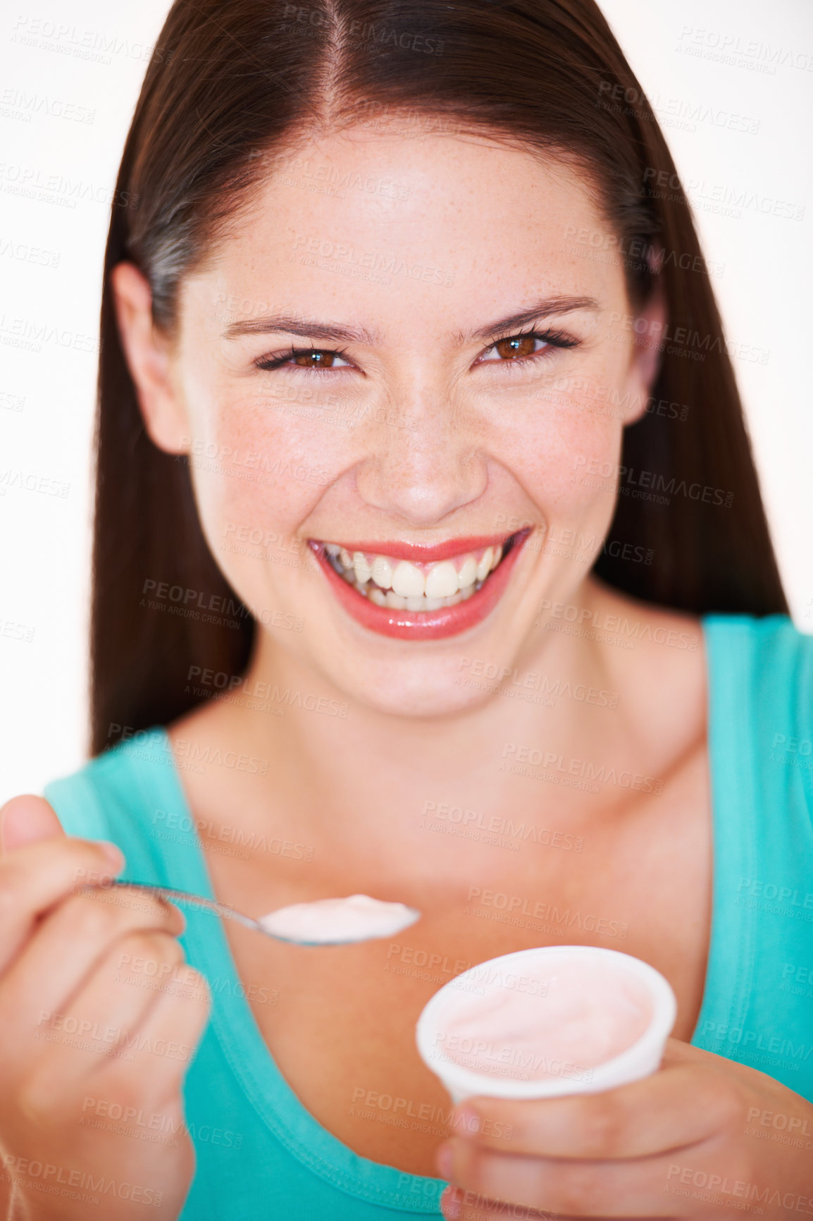 Buy stock photo Woman, eating and portrait with yogurt or healthy food, diet or nutrition in studio with happiness. Happy, face and girl with spoon, yoghurt and strawberry flavor of dairy, product or snack for lunch