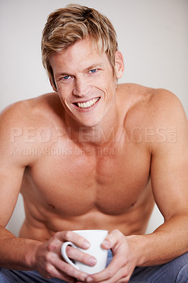 Buy stock photo Shirtless, portrait and man with coffee, drink and relax in home living room and start day with espresso. Healthy, person and smile with cup of tea, beverage or drinking latte in lounge of apartment