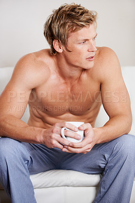 Buy stock photo Calm, morning and man with coffee, drink and relax in home living room thinking and planning day. Shirtless, person and drinking from cup with tea, beverage or espresso latte in lounge of apartment