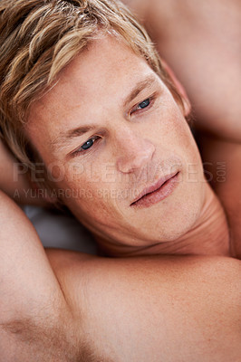 Buy stock photo Face, thinking and a man, shirtless in the bedroom of his home closeup to relax or wake up in the morning. Idea, health and a confident young person or model in bed to rest on a weekend break