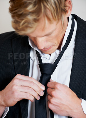 Buy stock photo Man, tie and suit in studio or white background for special event, confidence or formal clothes. Male person, model and hands or cool trendy style or blazer for dressing fashion, closeup or classy